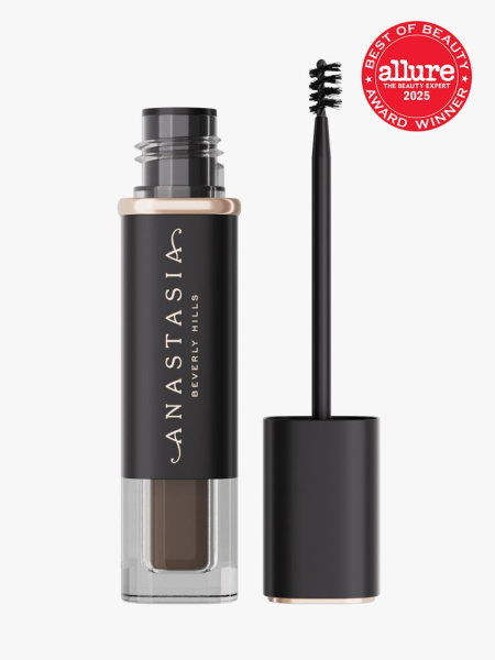 Anastasia Beverly Hills Volumizing Tinted Brow Gel in branded clear and black tube next to cap with brush applicator on light gray background with red Allure Best of Beauty seal in the top right corner