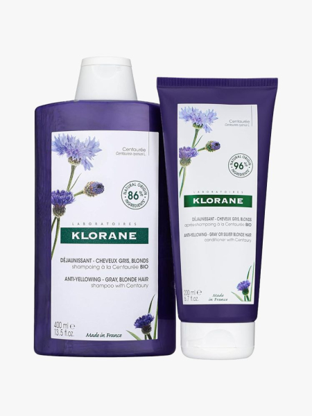 Klorane Anti-Yellowing Shampoo and Conditioner in branded components on a light gray background