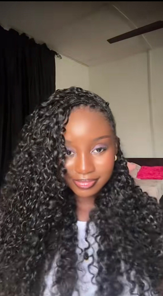 Olubolade Alexis wearing miracle knot boho braids