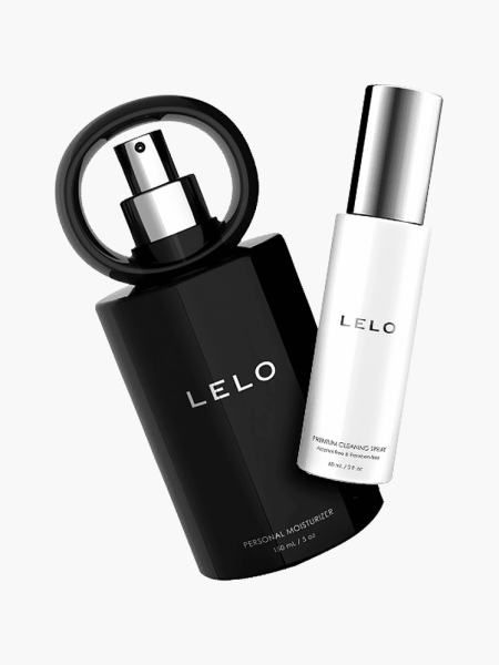 The Magic Touch Bundle with two branded white and black bottles with silver caps on light gray background